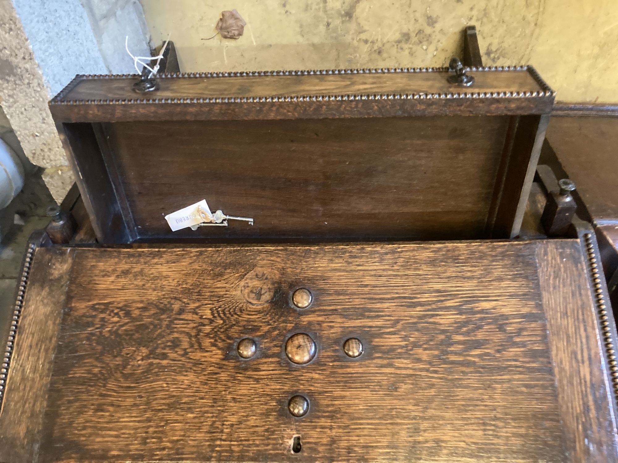A 1920s oak bureau width 82cm, depth 31cm, height 112cm